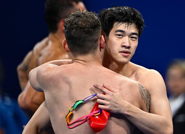 MK体育官网-混合泳接力夺金的背后，每个人的故事都熠熠生辉